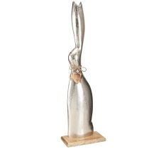 položky Ozdobný strieborný králik na drevenom podstavci – Elegantná veľkonočná figúrka s príveskom srdiečko V60cm