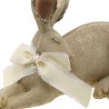 Floristik24 Veľkonočný zajačik ležiaci s mašľou Polyresinová veľkonočná dekorácia 28cm