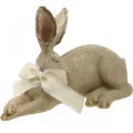 Floristik24 Veľkonočný zajačik ležiaci s mašľou Polyresinová veľkonočná dekorácia 28cm