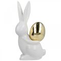 Floristik24 Veľkonočné zajačiky elegantné, keramické zajačiky so zlatým vajíčkom, veľkonočná dekorácia biela, zlatá V18cm 2ks