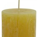 Floristik24 Stĺpové sviečky Rustikálne farebné sviečky žlté 60/110mm 4ks